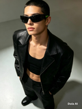 Foster Grant Sports Wrap Sunglasses - model in black leather jacket and all-black outfit