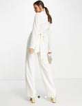 Ivory belted blazer jumpsuit - back view with tie belt