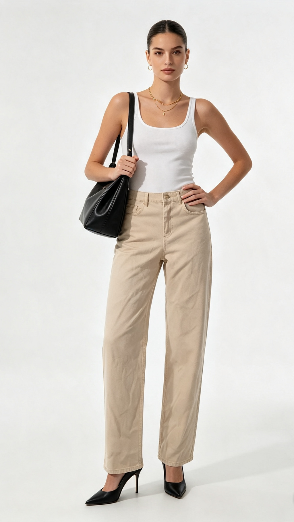 Beige wide-leg trousers - studio shot with white tank